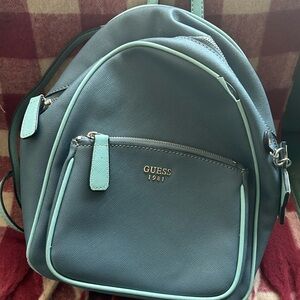 Gently used Guess backpack. Adorable follower tag!